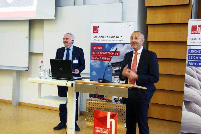 MR Werner Loscheider (BMWi) bei seinen einleitenden Worten mit Prof. Dr. Otto Huber, Initiator der Veranstaltung..